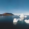 Iceberg and ice from glacier in arctic nature landscape in Ilulissat,Greenland. Aerial drone photo of icebergs in Ilulissat icefjord. Affected by climate change and global warming.